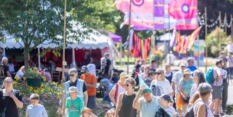 People wandering through the Ventnor Fringe Festival Village