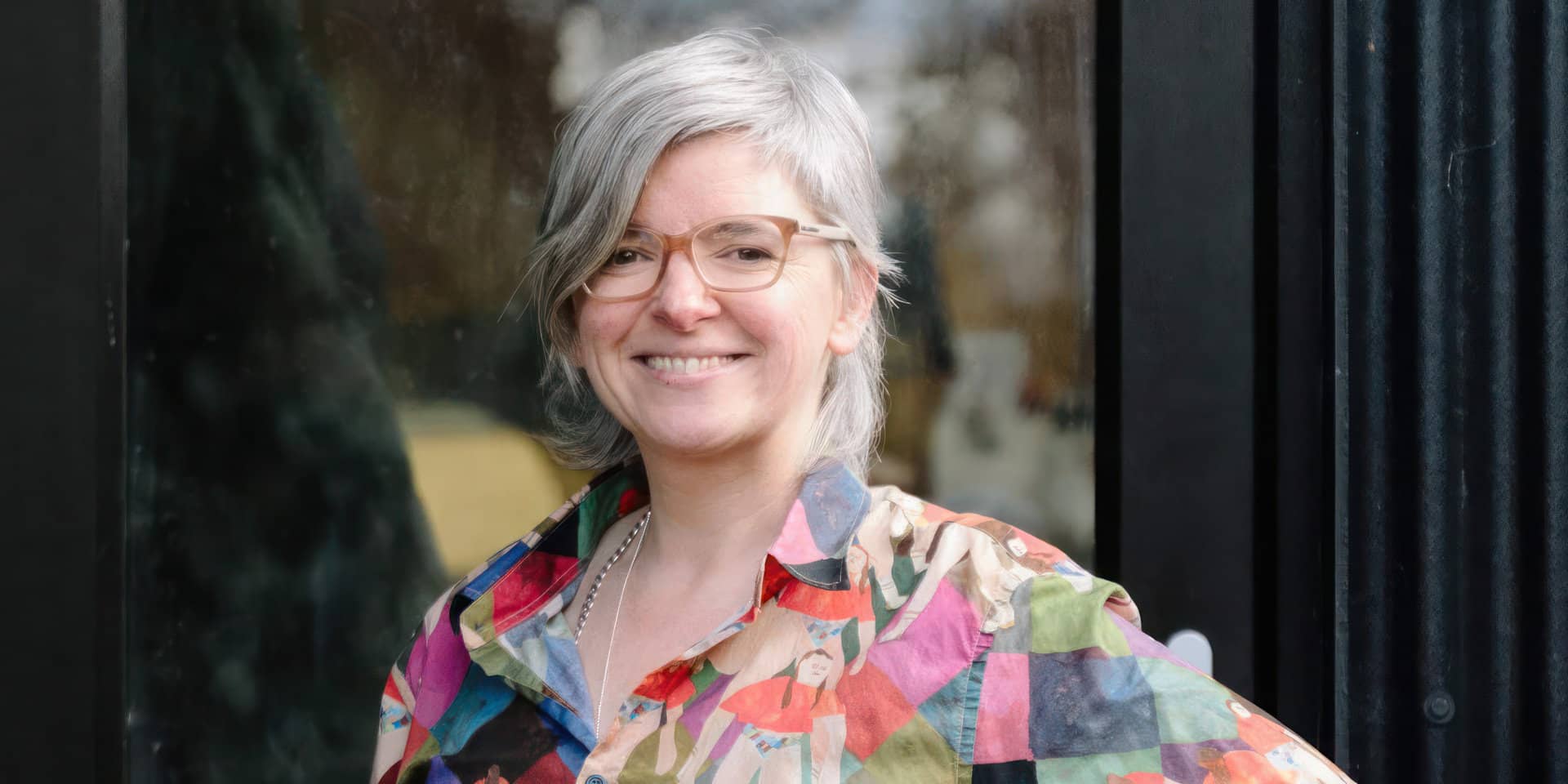 Portrait of Alys Scott Hawkins looking into the camera smiling