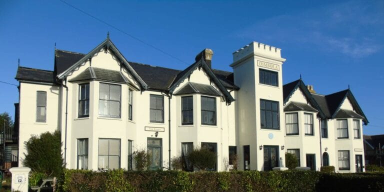Dimbola Museum and Galleries building from the outside with blue sky behind