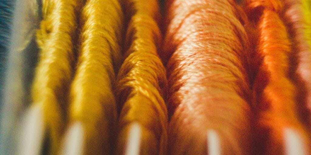 yellow and orange embroidery threads