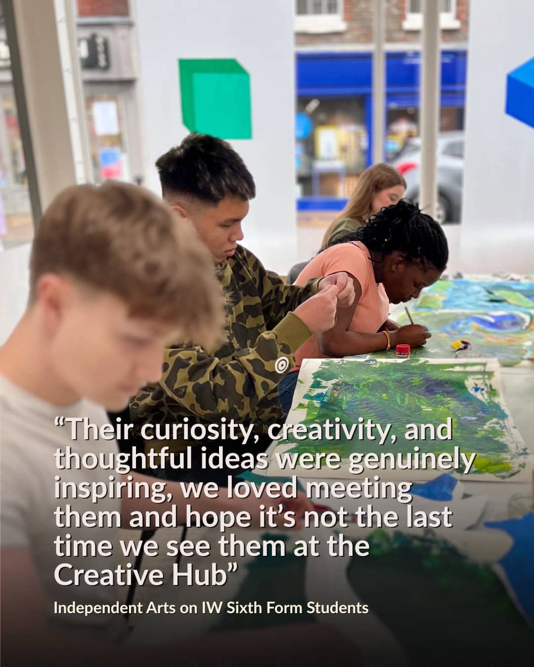 Teenage pupils creating artworks