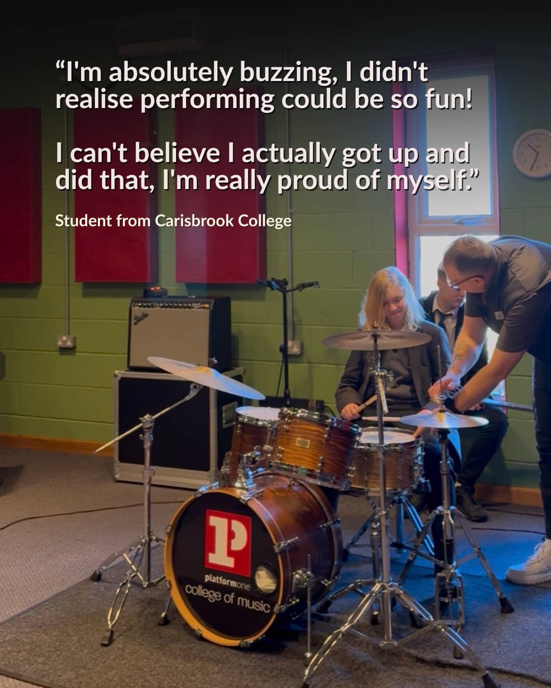 Teenage pupil playing the drums
