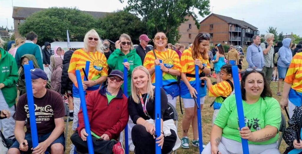 A group of people from VIVA Carnival smiling for the camera.