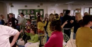 A group of people who attended the IW Creative Conference 2026 participating in Zoie Logic's movement exercise.