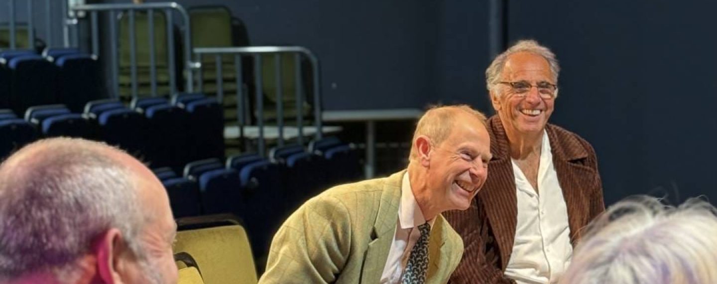 HRH The DUke of Edinburgh and Gavin Stride from Creative Island, laughing in the Anthony Minghella Theatre at Quay Arts.